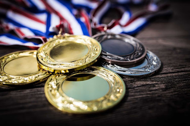 Celebrate Your Victory: Finishers Medal Day and Fitness Finders Toe Tokens